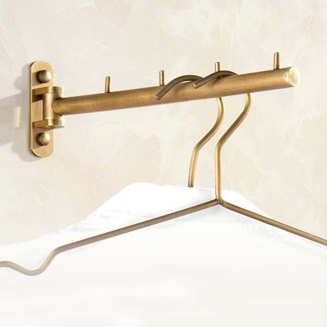 This robe hook can be installed in a bathroom or back of the door, purchase from Homelava.com to have a lower price and higher quality. Laundry Room Shower Rod, Brass Clothes Rod, Brass Clothes Rail, Brass Robe Hook, Brass Laundry Room, Laundry Room Clothing Rod, Laundry Room Wall Hooks, Back Of Door Hooks, Brass Closet Rod