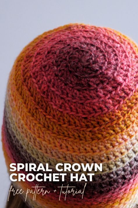 If you’re looking for a quick and easy hat that’s still interesting enough to crochet, this is a great place to start. The crown of this hat spirals around, revealing a pretty texture that looks great with a variety of yarns. #BHooked #Crochet #HowToCrochet #CrochetPattern #CrochetTutoial #CrochetHat #CrochetProject Crochet Hats Free Pattern Spiral, Magic Circle Hat Crochet, Spiral Crochet Hat Pattern Free, Crochet Spiral Beanie Pattern Free, Spiral Beanie Crochet Pattern, Spiral Crochet Hat, Crochet Spiral Hat, Crochet Hat In The Round, Crochet Beanie In The Round