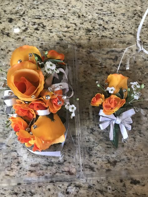 Orange And White Corsage And Boutonniere, Orange And White Boutonniere, Prom Flowers Corsage Orange, Orange And White Corsage, Orange Flower Corsage, Prom Flowers Bouquet Orange Dress, Orange Prom Corsage, Orange Prom Flowers, Orange Corsage And Boutonniere