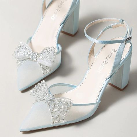 Say hello to the dreamiest dusty blue block heel wedding shoes, Athena. With a versatile 3-inch heel and a beautiful crystal-embellished bow at the front, these blue crystal wedding heels allow you to add a soft pop of color to your wedding look. The best part? You can decide whether you want a timeless slingback or a classic ankle strap block heel with the removable ankle strap feature. FEATURES: Reviews say: fit true to size Heel Height: 3 inches or 7.6 cm Exquisitely hand-sewn crystals and beads Special crystals designed to not catch on your dress hem Colour: Blue Handmade Upper Material: Silk and mesh Lining Material: Leather lining Sole Material: Leather sole Ankle straps for security Pointed toe to elongate the legs Heavy padding for all-day comfort Block Heel Wedding Shoes, Bella Belle Shoes, Belle Shoes, Blue Block Heels, Indian Shoes, Wedding Shoes Comfortable, Blue Wedding Shoes, Shoes Heels Classy, Ankle Strap Block Heel