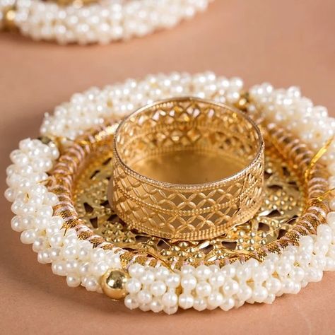 Pearl Ring Tlight DM us for more details or Whatsapp us on 9867422790 Diwali Home Decoration, Shadow Casting, Toran Design, Golden Candle, Gotta Patti Work, Pearl Tea, Diwali Decoration Items, Tea Light Candle Holders, Gotta Patti