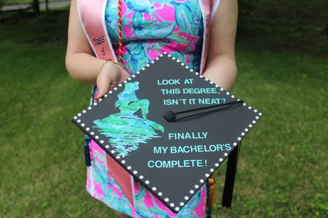 Little Mermaid inspired graduation cap Biology Graduation Cap, Graduation Photo Boards, Disney Grad Caps, Nurse Graduation Cap Designs, Diy Graduation Decorations, Disney Graduation Cap, Teacher Graduation Cap, Graduation Hairstyles With Cap, Nurse Graduation Cap