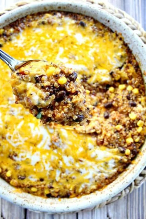 Quinoa Black Bean Enchilada Casserole. Perfect for a meatless weeknight meal and unique enough for company, loaded with healthy protein and vegetables. #quinoa #vegetarian #healthyrecipes #recipes Casserole With Black Beans, Black Bean Enchilada Casserole, Bean Enchilada Casserole, Quinoa Enchilada Casserole, Quinoa Enchilada, Black Bean Enchiladas, Black Bean Quinoa, Bean Enchiladas, Enchilada Casserole