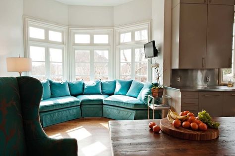 Love this couch! Where can I get it??? Bay Window Dining Table, Bay Window Couch, Window Couch, Bay Window Dining, Turquoise Couch, Velvet Sectional, House Of Turquoise, Cozy Couch, Eclectic Kitchen