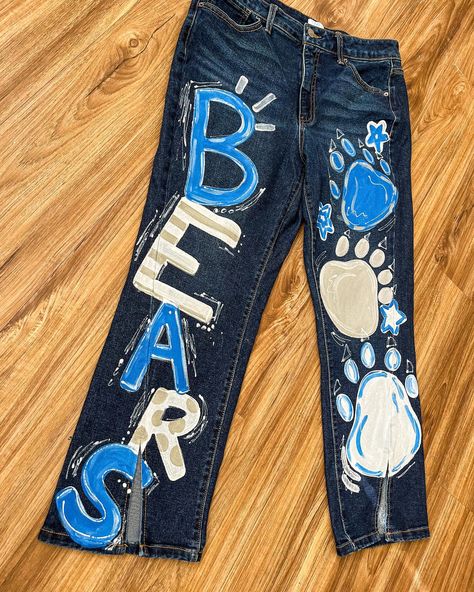 Looking for painted jeans? I am now doing customizable jeans!🩵🫶🏼🤪 #jeans #paintedjeans #art #paint #seniorjeans #smallbusiness Homecoming Painted Jeans Ideas Diy, Decorated Jeans School Spirit, Senior Painted Jeans, Jean Painting, Senior Jeans, Painted Things, Leg Art, Senior Ideas, Homecoming Ideas