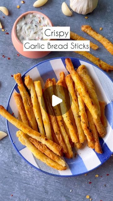 Pickles & Wine on Instagram: "Crispy Garlic Breadsticks  If you too love eating these crispy pre-meal garlic breadsticks, make them in 10 mins 😍  Ingredients:   3 TBSP Melted Butter 1 TBSP Coriander  Salt To Taste  1 TSP Chilli Flakes  1 TSP Garlic Powder (optional)  6-7 Bread Slices   Process:   Bake in Airfryer for 5 to 7 minutes at 180 degrees or until crispy  #bread #crispy #garlic #butter #breadstick #herb #recipe #recipes #easyrecipe   bread, crispy, sticks, recipe, recipes, easy recipe, easy recipes, Pickles and Wine" Salt Sticks Recipe, Garlic Sticks, Garlic Bread Sticks, Crispy Bread, Bread Sticks Recipe, Garlic Breadsticks, Crispy Garlic, Bread Sticks, Tasty Snacks