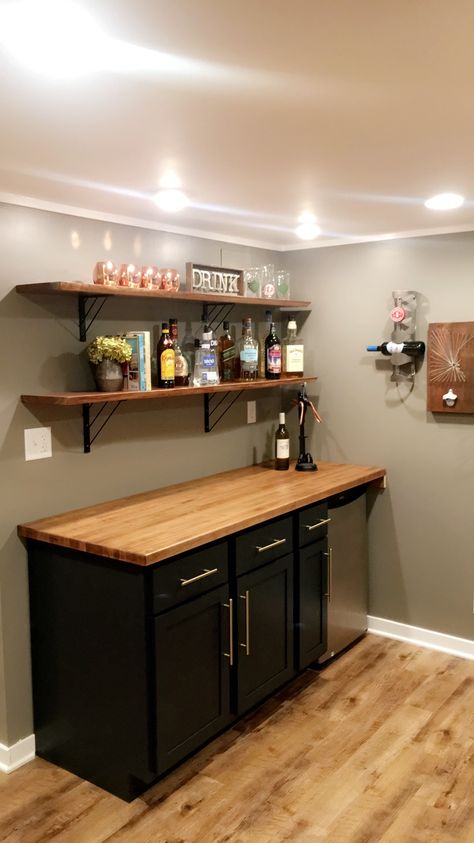 Basement bar homemade counter and exposed shelves Dry Bar For Basement, Basement Counter Bar Ideas, Bar Area In Garage, Small Bars For Basements, Small Bar Ideas For Basement, Wall Cabinet With Drawers, Homemade Basement Bar, Cheap Basement Bar Ideas, Bar Remodel Ideas Basement