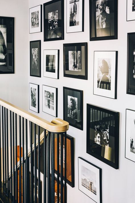 Where to Put a Gallery Wall in Your Home, According to the Experts Family Photo Gallery Wall, Gallery Wall Staircase, Picture Arrangements, Stone Fireplace Surround, Photo Wall Gallery, Stair Case, Farmhouse Remodel, Mother Art, Bold Wallpaper