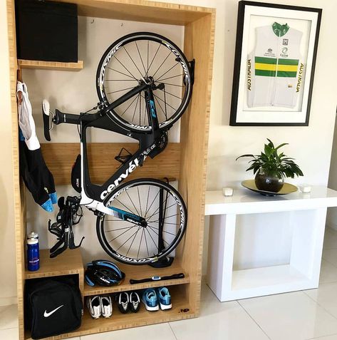 11 Indoor Bike Storage Ideas You'll Love (Small Spaces) | GoDownsize Indoor Bike Storage Small Spaces, Bike Helmet Storage, Bike Storage Small Space, Bike Storage In Van, Bike Storage Ideas, Bike Storage Home, Fitness Corner, Bike Storage Room, Bike Storage Apartment