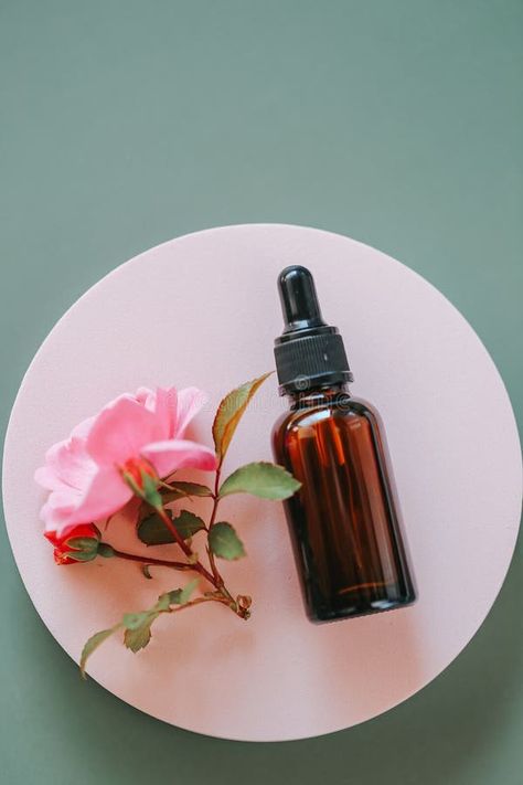 Cosmetics with rose extract.Rose oil in a glass bottle on a pink podium on a gray background.View from above stock photography Benefits Of Rose Water, Skin Images, View From Above, Beauty Elixir, Rose Extract, Facial Mist, Rose Oil, Daily Skin Care Routine, Daily Skin Care