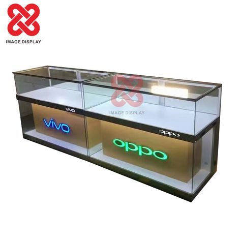 Retail High End Cell Phone Display Showcase OPPO/VIVO Mobile Phone Shop showcases glass display cabinet https://m.alibaba.com/product/1600477693184/Retail-High-End-Cell-Phone-Display.html?__sceneInfo={"cacheTime":"1800000","type":"appDetailShare"} Vivo Mobile Phone, Mobile Shop Design, Vivo Mobile, Phone Table, Glass Display Cabinet, Mobile Phone Shops, Display Showcase, Phone Display, Kiosk Design