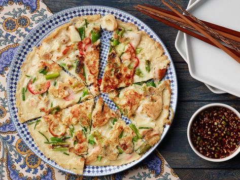 Haemul Pajeon (Korean Seafood Pancake) Recipe | Food Network Kitchen | Food Network Haemul Pajeon Recipe, Korean Seafood Pancake Recipe, Pajeon Recipe, Haemul Pajeon, Korean Seafood Pancake, Korean Seafood, Seafood Pancake, Restaurant Appetizers, Shrimp Toast