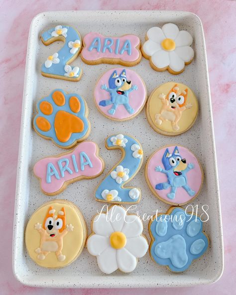 Bluey Cookies 🐾💙 Pricing? 👉🏻 https://msha.ke/alecreations918 • • • • #alecreations918 #tulsasmallbuisness #tulsaoklahoma #decoratedsugarcookies #customcookies #cookie #cookies #decoratedcookies #inspirationcookies #cookiesofinstagram #desserts #dessertideas #dessertideas #partyideas #party #sugarcookies #royalicing #royalicingcookies #cookies #cookiesideas #royalicingideas #blueycookies #bluey #blueyfanart #blueyart #blueyparty #blueycake #blueyandbingo #blueybirthday #blueybirthdayparty #blu... Bluey Cookies For Girl, Bluey Cupcakes, Bluey Cookies, Bingo Party, Bluey Party, Second Birthday Ideas, Bluey Birthday, Party Hardy, Decorating Cookies