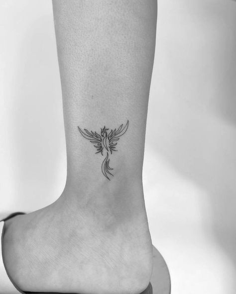 Minimalist phoenix tattoo on ankle Cute Pheonix Tattoo, Minimal Phoenix Tattoo Design, Tiny Phoenix Tattoos For Women, Simple Phoenix Tattoo, Tato Phoenix, Fenix Tattoo, Phoenix Tattoo Feminine, Small Phoenix Tattoos, Phönix Tattoo