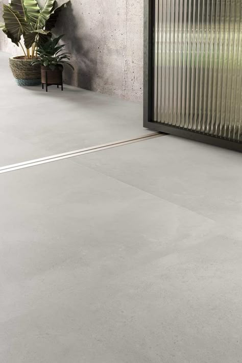 1 Metre x 1 Metre 1800 Perla Matt Large Format Porcelain Tile      A modern range of large-format porcelain tiles, ideal for today’s open-plan living.The Matt finish is available in an Anti-Slip version for that seamless inside / outside loo... Polished Concrete Floor Tiles, Inside Outside Flooring, Tiled Floors Kitchen, Large Floor Tiles Kitchen, Large Tile Kitchen Floor, Basement Tile Floor Ideas, Office Floor Tiles, Large Tile Flooring, Large Format Porcelain Tile