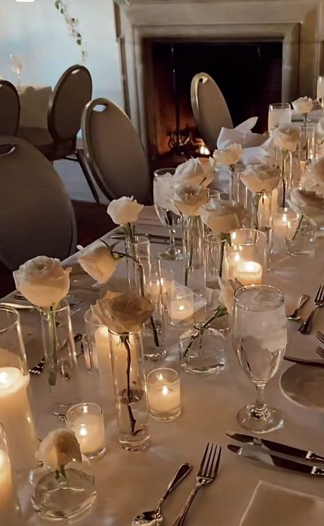 Minimalist White Rose Centerpiece, Simple White Rose Table Decor, Candle And Rose Centerpieces Wedding, Long Stem Rose Centerpiece Wedding, Single Roses Centerpieces, White Candles Wedding Table, Candles Wedding Reception Table, Wedding Table Decorations White Roses, Candle And Roses Centerpieces