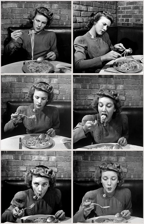 Alfred EisenstaedtWoman eating spaghetti in restaurantNew YorkNY1941 Woman Eating Spaghetti, Eating Dinner Reference, Woman Eating Photography, People Eating Photography, Eating Drawing Reference, Someone Eating, Women Eating, Person Eating, Eating People