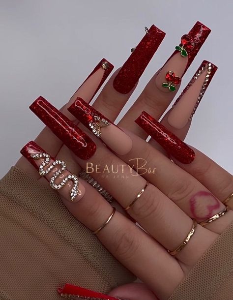 Red Acrylic Nails With Charms, Red And Gold Acrylics, Red Long Nails Designs, Nails For Prom Red Dress, Red Baddie Nails Acrylic, Red Blinged Out Nails, Latina Nails Red, Red Junk Nails, Red Glam Nails