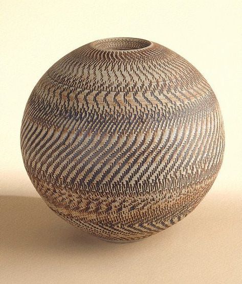 An image of Round unglazed pot with iron oxide colouring and chattered decoration by SHIGA Shigeo Textured Pottery, Pottery Projects, Brown Vase, Pottery Collection, Ceramic Texture, Green Pottery, Rustic Pottery, Vase Ceramic, Shiga