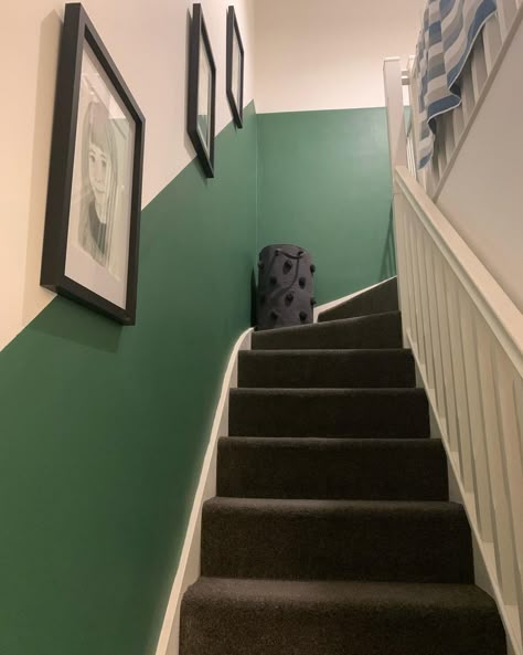 Split Wall Paint Hallway, Half Wall Painted Stairs, Half Painted Wall Hallway Stairs, Dark Green Staircase Wall, Olive Green Staircase, Green Staircase Wall, Hallway Paint Colors To Brighten, Painted Wood Stairs, Hallway Wall Colors