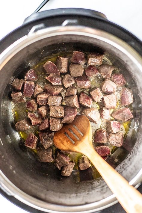 venison sauteed in an instant pot with a wooden spoon Venison Stew Slow Cooker, Deer Steak Recipes, Deer Butchering, Backstrap Recipes, How To Cook Venison, Venison Stew, Man Recipes, Deer Recipes, Game Meat