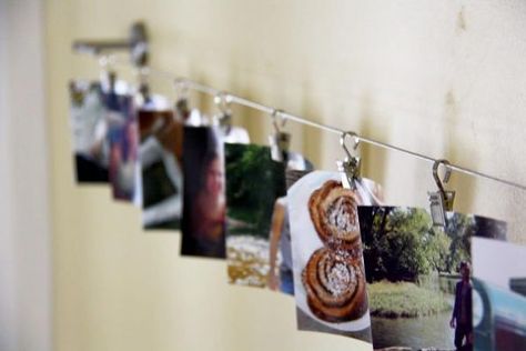 ikea hack curtain wire to photo display, design d cor, repurposing upcycling, Turn a curtain wire from Ikea into a fun photo display Ikea Curtain Wire, Ikea Curtain, Love Photo Collage, Displaying Pictures, Photo Hanger, Installation Ideas, Curtain Wire, Art Placement, Ikea Curtains