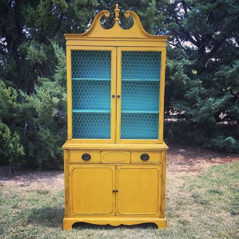 Mustard yellow China cabinet with turquoise accents. Mustard Yellow Furniture, Mustard China Cabinet, Retro Yellow Kitchen Cabinets, Yellow China Cabinet, Mustard Yellow Dresser Painted Furniture, Yellowkitchen Cabinets, Yellow Dressers Painted, Yellow Painted Furniture, She Shed Interior