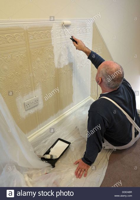 Download this stock image: Traditional decorating, painter and decorator painting newly hung lincrusta on stairs with paint roller - DDEABR from Alamy's library of millions of high resolution stock photos, illustrations and vectors. Traditional Decorating, Construction Images, Painter And Decorator, Paint Roller, Traditional Decor, Paint Colors, Painter, Photo Image, Stairs