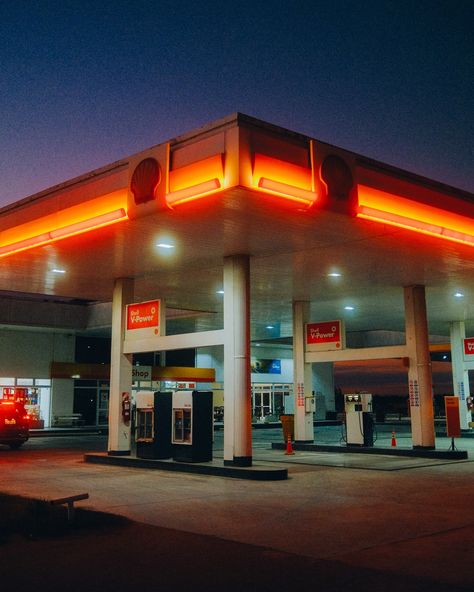 A gas station at night photo – Free Petrol Image on Unsplash Petrol Station Photoshoot, Petrol Station Aesthetic, Gas Station At Night, Gas Station Aesthetic, Retro Gas Station, Gasoline Station, Aesthetic Scenery, Test Shoot, Outdoor Buildings