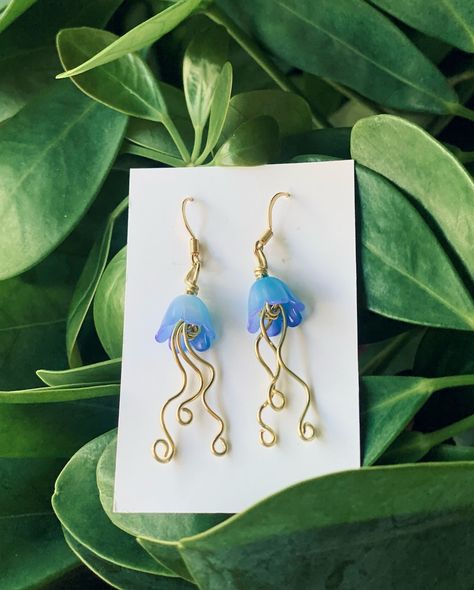 Mermaid’s companion, the jellyfish earrings are finally having their instagram moment! 🪼 You guys loved them on my booth at every market, and so they are finally up here for everyone to marvel at them✨ In both gold and silver colors, these earrings are the perfect little things for a beautiful splash of color to your daily styling! Get yours today! 🔮DM for details🔮 #jewelry #earrings #jellyfish #smallbuisiness #magical #handmade #handmadejewelry Jellyfish Jewelry, Jellyfish Earrings, Small B, Jellyfish, Gold And Silver, Little Things, Color Splash, Silver Color, For Everyone