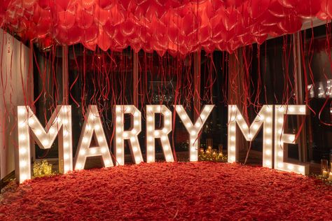 A dream proposal for Maulen and Dinara. Our AMAZING team of proposal planners were tasked with transforming the Yi Private dining room at one of our favourite places. We decorated the room with romantic décor and light up “Marry Me” letters, while the ceiling was covered with 200 red balloons.⁣ Find out more about proposing at The Shard here Marry Me Room Decoration, Propose Decoration, Purposals Ideas Engagement, Marry Me Balloons, Marry Me Letters, Marry Me Proposal, Room Surprise, Cute Proposal Ideas, A Good Woman