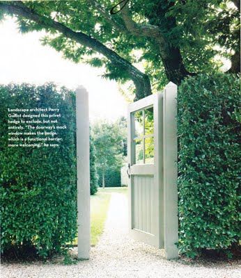 This gate mimics a front door with the windows and size. Surrounded by the privet hedge, there is no guessing where the entrance is located.  Image from House & Garden. Boxwood Fence Front Yard, Hedge With Gate Entrance, Painted Privacy Fence, Garden Door Design, Hedge Fence, Privet Hedge, Garden Gates And Fencing, Boxwood Garden, Backyard Privacy