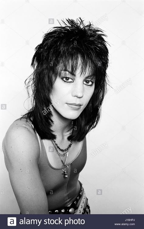 Download this stock image: Joan Jett photographed in Philadelphia, PA, June 1984. © mpi09 / MediaPunch - J16HPJ from Alamy's library of millions of high resolution stock photos, illustrations and vectors. 80s Shag Hairstyles, 80s Shag, Joan Jett Hair, Joan Jett Style, Jet Hair, 80s Mullet, Joan Jett And The Blackhearts, Black Haircut, 80s Hair