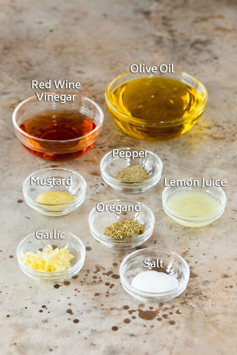 This homemade Greek salad dressing is a blend of olive oil, fresh lemon juice, red wine vinegar, herbs and spices. A quick and easy dressing that adds so much flavor to any salad, and can also be used as a marinade or to season roasted veggies. Red Wine Vinegar Salad Dressing, Asparagus On The Grill, How To Grill Asparagus, Grill Asparagus, Asparagus Grilled, Olive Oil Salad Dressing, Oil Vinegar Dressing, Cabin Food, Veggie Salads