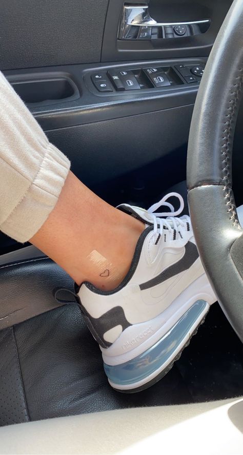 Simplistic Ankle Tattoos, Tiny Heart Tattoo On Ankle, Tattoo On Inside Of Ankle, Small Heart Ankle Tattoo, Heart On Ankle Tattoo, Ankle Tattoo Heart, Heart Tattoo Placement Ideas, Tiny Ankle Tattoo, Heart Tattoo On Ankle