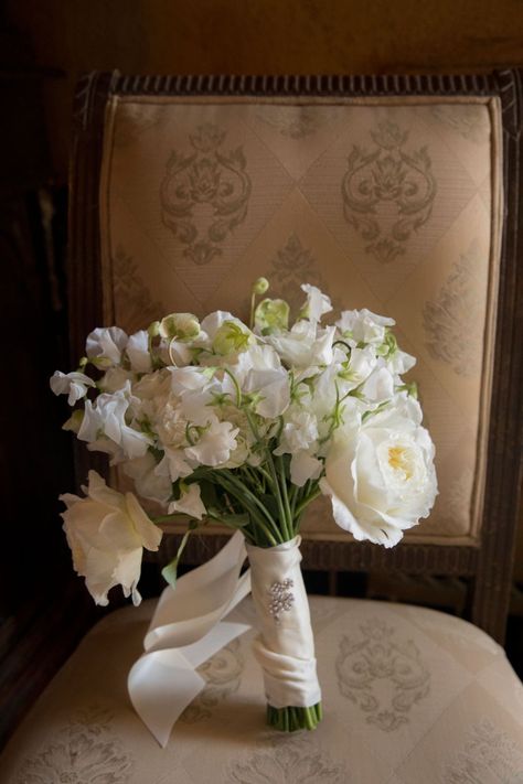 real wedding photo at the mar-a-lago club royal wedding inspired by prince harry meghan markle white wedding bouquet wrapped with silk ribbon Royal Wedding Flowers, Bouquet Ribbon Wrap, Wedding Bouquet Ribbon, Royal Wedding Themes, White Garden Roses, Secret Garden Theme, Inside Weddings, A Secret Garden, Silk Wedding Bouquets