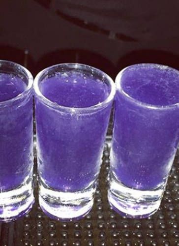 Our drink of the day: the purple haze shot. Can you guess why? Check it out here... Cheers! #cocktailoftheday #cocktailsandshots #purplehaze #jimihendrix Purple Themes Party, Purple Food Party, Purple Edible Glitter Drinks, Pretty Shots Alcohol, Purple Shots Recipe, Euphoria Party Drinks, Purple Euphoria Party, Euphoria Themed Party Food, Purple Shots Alcohol