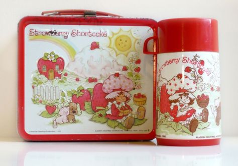 This was my lunchbox when I was in the first grade. Well, not this EXACT lunchbox, but the one I faithfully carried to school each day looked exactly like this one. I used it to my pack my typical... Lunch Box Thermos, Strawberry Shortcakes, 1980s Childhood, Vintage Lunch Boxes, Childhood Memories 70s, Vintage Strawberry Shortcake, 80s Nostalgia, Metal Lunch Box, Childhood Toys