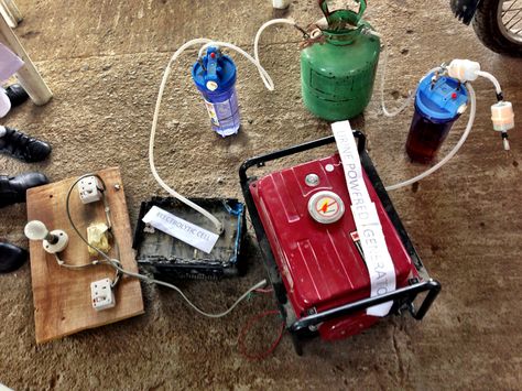 urine powered electricity generator at maker faire africa - designboom | architecture & design magazine Alternative Energy Projects, Small Generators, Energy Water, Maker Faire, Energy Logo, Alternative Energy Sources, Power Generator, Energy Projects, Power Energy