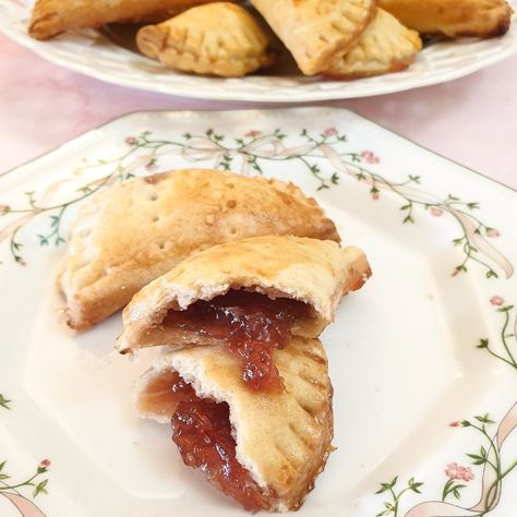 These delicious little jam turnovers are a cross between a biscuit and a tart. They are made with a crispy buttery pastry and just enough jam in the centre to satisfy your sugar cravings but without being too sweet. I was a bit unsure about what to call this recipe. I dithered between jam puffs... Read More The post Jam turnovers appeared first on Foodle Club. Date Turnovers, Fruit Turnovers Puff Pastries, Jam Turnovers, Jam Tarts Recipe, Jam Turnovers Pastries, Puff Pastry Jam Tarts, Mixed Berry Turnovers, Pear Jam, Turnover Recipes