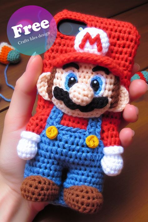 Crocheted Mario Phone Case Nintendo Crochet, Nintendo Crafts, Mario Crochet, Crochet Phone Cover, Disney Crochet Patterns, Crochet Mug Cozy, Crochet Phone Cases, Crochet Case, Knit Hat