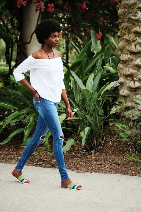 University of South Florida student Uchoku wears a simple white off-the-shoulder blouse with distressed light-wash jeans and colorful Toms shoes. Toms Shoes Outfits Women, Outfit With Toms, Student Nails, Daycare Teacher Outfits, Cute Outfits Casual, Toms Shoes Outfits, Casual Outfits Fashion, Rock Jeans, Toms Shoes Outlet