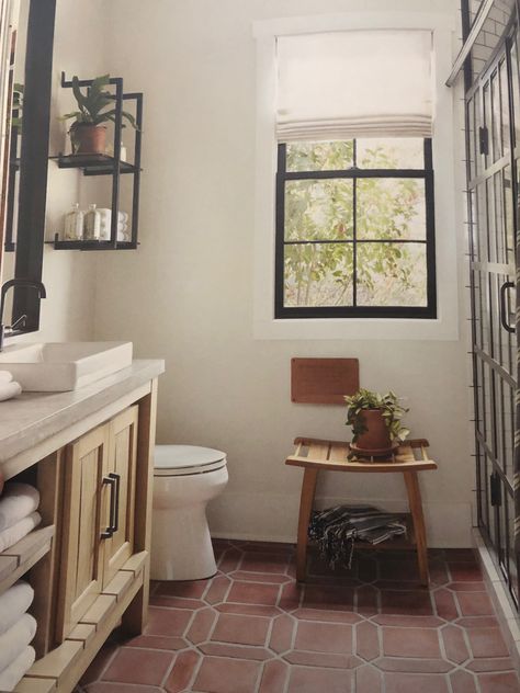 Bathroom With Terracotta Floor Tiles, Shelving Above Toilet, Bathroom Terracotta Floor, Red Tile Bathroom, Red Tile Floor, Black Shelving, Lake Bathroom, Above Toilet, Spanish Home Decor