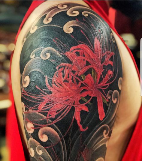 Red spider Lily tattoo with traditional Japanese clouds Spider Tattoo Traditional, Japanese Spider Lily Tattoo, Japanese Spider Lily, Lily Tattoo Sleeve, Crisantemo Tattoo, Black Red Tattoo, Lilly Tattoo Design, Lily Tattoo Meaning, Spider Lily Tattoo