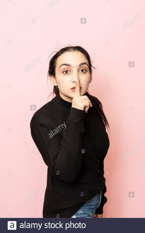 Download this stock image: Keep quiet sign. Portrait of a beautiful woman in casual clothing showing hand gesture keep silence. Tss, Shh. Facial expressions of young female - 2AJTMKX from Alamy's library of millions of high resolution stock photos, illustrations and vectors. Shh Pose, Keep Quiet, Hand Gesture, Stickers Printable, Facial Expressions, Female Images, Casual Clothing, Scrapbook Stickers, Beautiful Woman