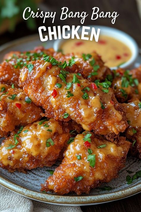 Savor the crunch of Crispy Bang Bang Chicken! This easy and delicious recipe features juicy chicken bites coated in a crispy crust, tossed in a creamy, spicy sauce. Perfect for a quick dinner or game day snacks. Everyone will love this tasty dish! Chris Cho Spicy Sweet Fried Chicken, Crispy Sweet Chili Chicken, Bang Bang Chicken Tenders, Chicken Bang Bang Recipe, Crispy Bang Bang Chicken, Chicken In Buttermilk, Bang Bang Chicken Recipe, Crispy Tenders, 15 Minute Meals Dinners