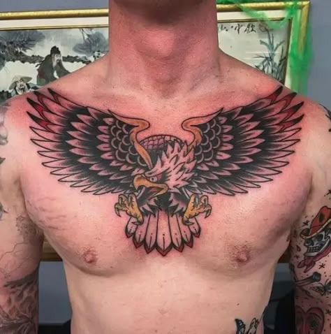 The Eagle Tattoo Meaning And 115+ Soaring Eagle Tattoos American Traditional Eagle Chest Tattoo, Eagle With Skull Tattoo, Eagle Back Tattoo Men, Mid Chest Tattoo Men, Chest Tattoo Eagle, Eagle Chest Tattoo Men, Traditional Eagle Chest Tattoo, Traditional Tattoo Eagle Chest, Cool Chest Tattoos Men