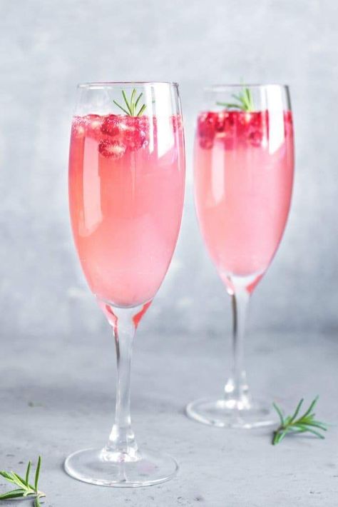 French Rose Champagne Punch is a gorgeous yet easy drink to serve for special occasions, especially for a crowd. It's an easy cocktail recipe to make and is perfect to serve for weddings, Valentine's Day, New Years, showers, and Mother's Day. It's beautiful pink color is perfect for toasting, and you will love the flavor. #champagne #gin #champagnepunch #weddingpunch #valentinesdaycocktails #rosecocktails Pink Champagne Punch, Cocktails With Champagne, Champagne Punch Recipes, Cocktail Prosecco, Wedding Punch, Champagne Recipe, Champagne Punch, Champagne Drinks, Champagne Cocktails