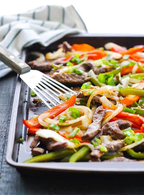 Dump-and-Bake Chinese Pepper Steak is an easy and healthy sheet pan dinner that's ready with just 10 minutes of prep! Healthy Dinner Recipes | Easy Dinner Ideas | Chinese food #TheSeasonedMom #steak #beef #ChineseFood #dinner Dinner Ideas Chinese, Roast Beef With Vegetables, Healthy Sheet Pan, Chinese Pepper Steak, Healthy Chinese Recipes, Chinese Beef, Steak Side Dishes, Sheet Pan Dinners Recipes, Recipes Easy Dinner