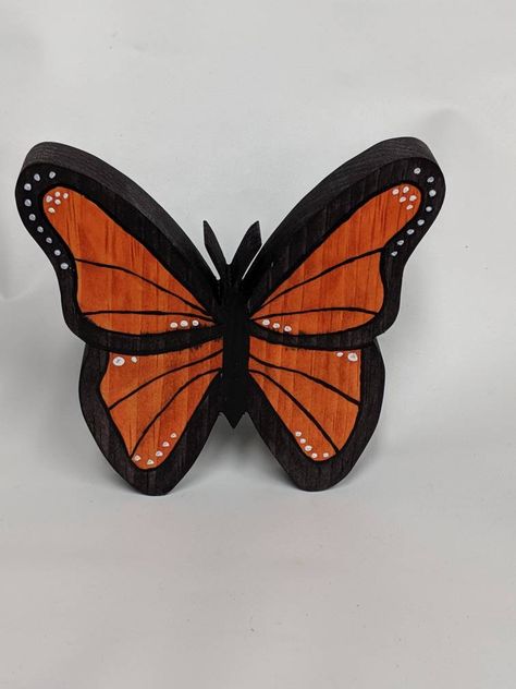 Double sided wooden butterfly. Hand painted. One side orange, the other blue. https://etsy.me/2ZHq1HA Wooden Butterfly Painting Ideas, Letter Painting Ideas Wooden, Cnc Crafts, Wood Pillars, Metal Butterfly Wall Art, Wooden Butterfly, Wood Butterfly, Butterfly House, Black Acrylic Paint